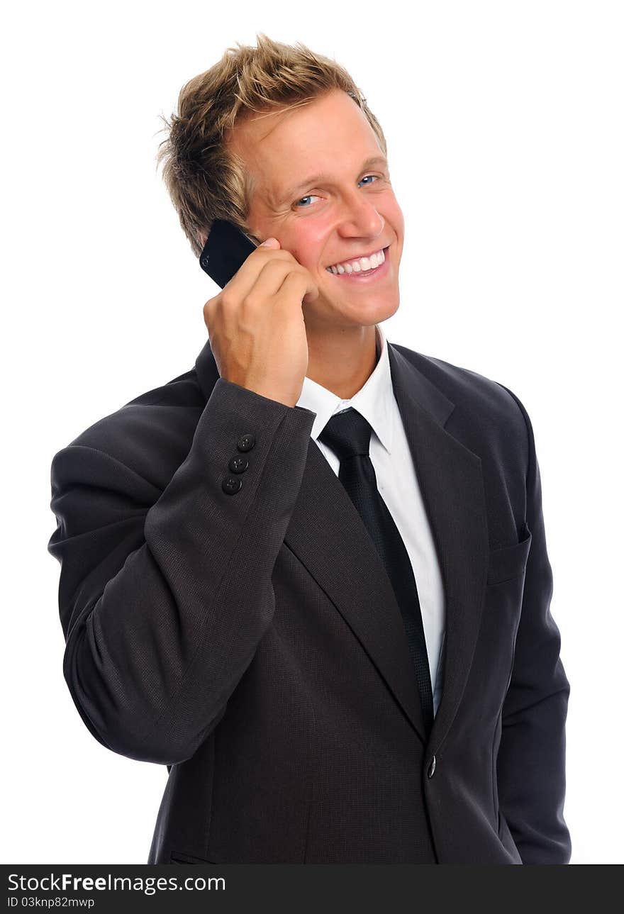 Smiling businessman on his mobile phone, communications concept. Smiling businessman on his mobile phone, communications concept