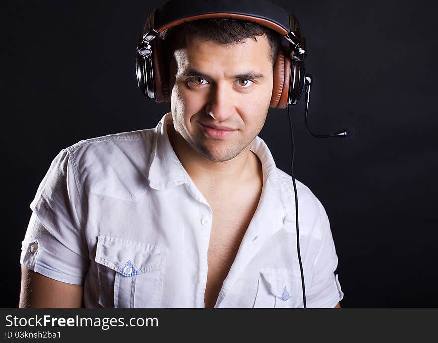 Confident man is wearing headphones. Confident man is wearing headphones