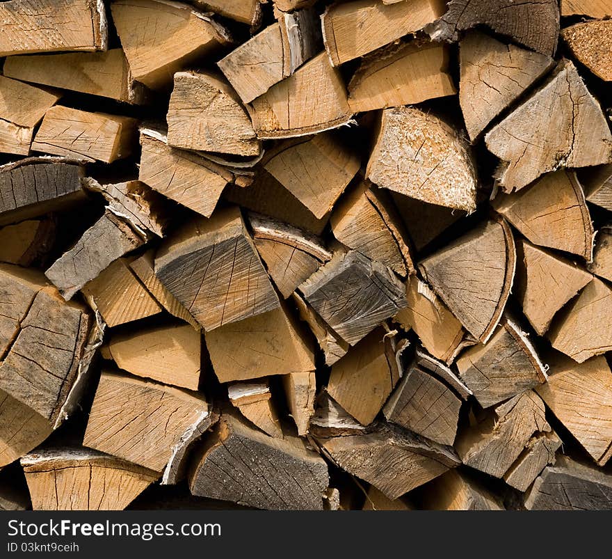 Finely cut firewood , pile of logs. Finely cut firewood , pile of logs