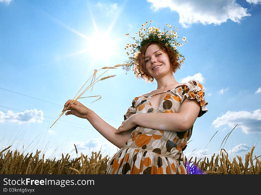 Woman in wheat field