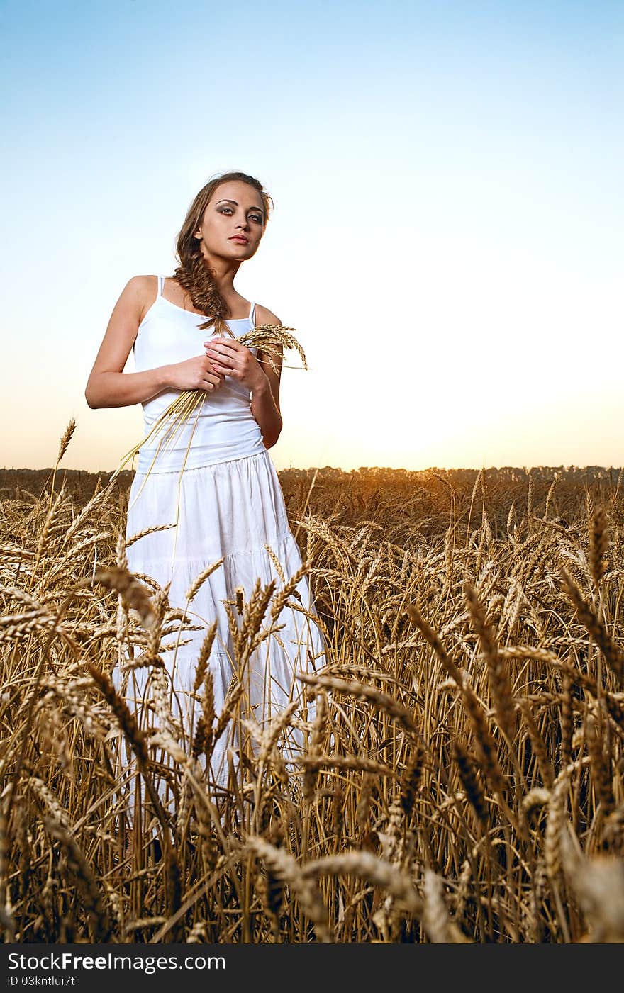 Woman In Wheat Field