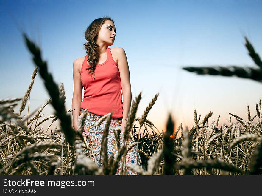 Woman in wheat field