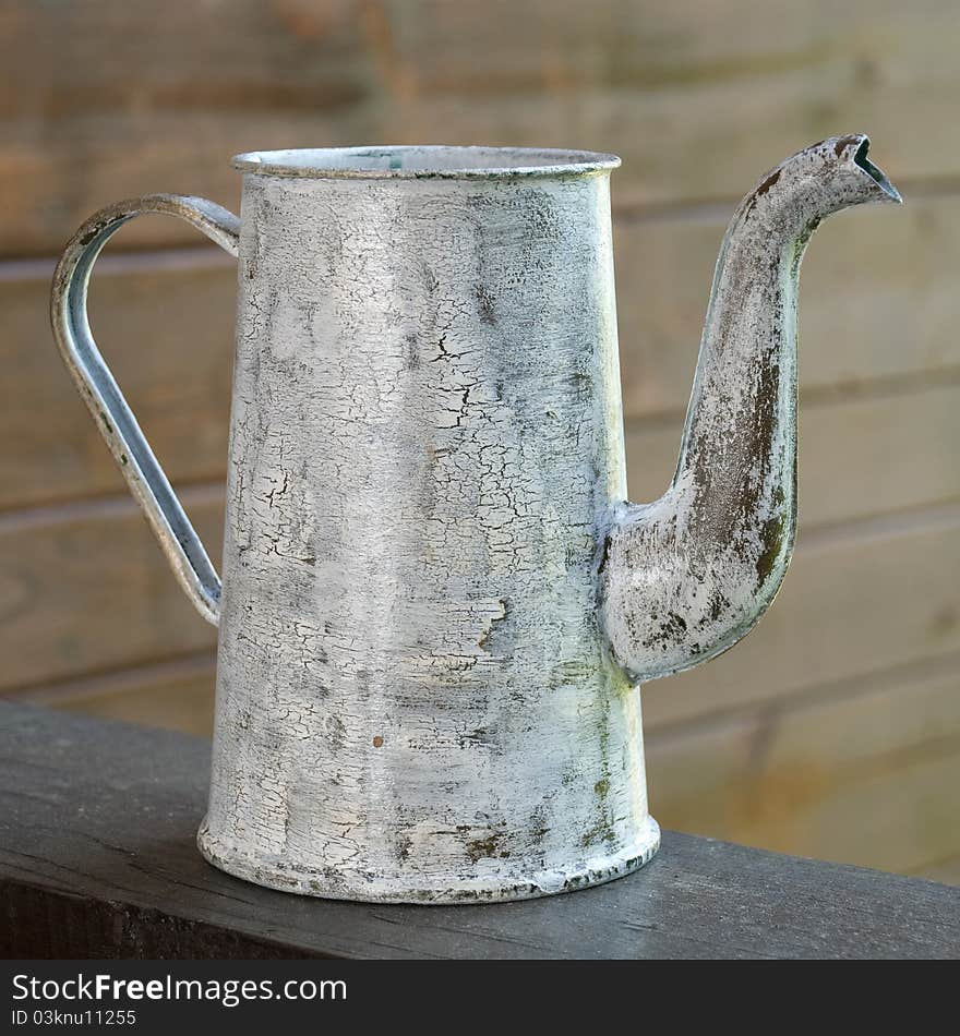 Old watering can