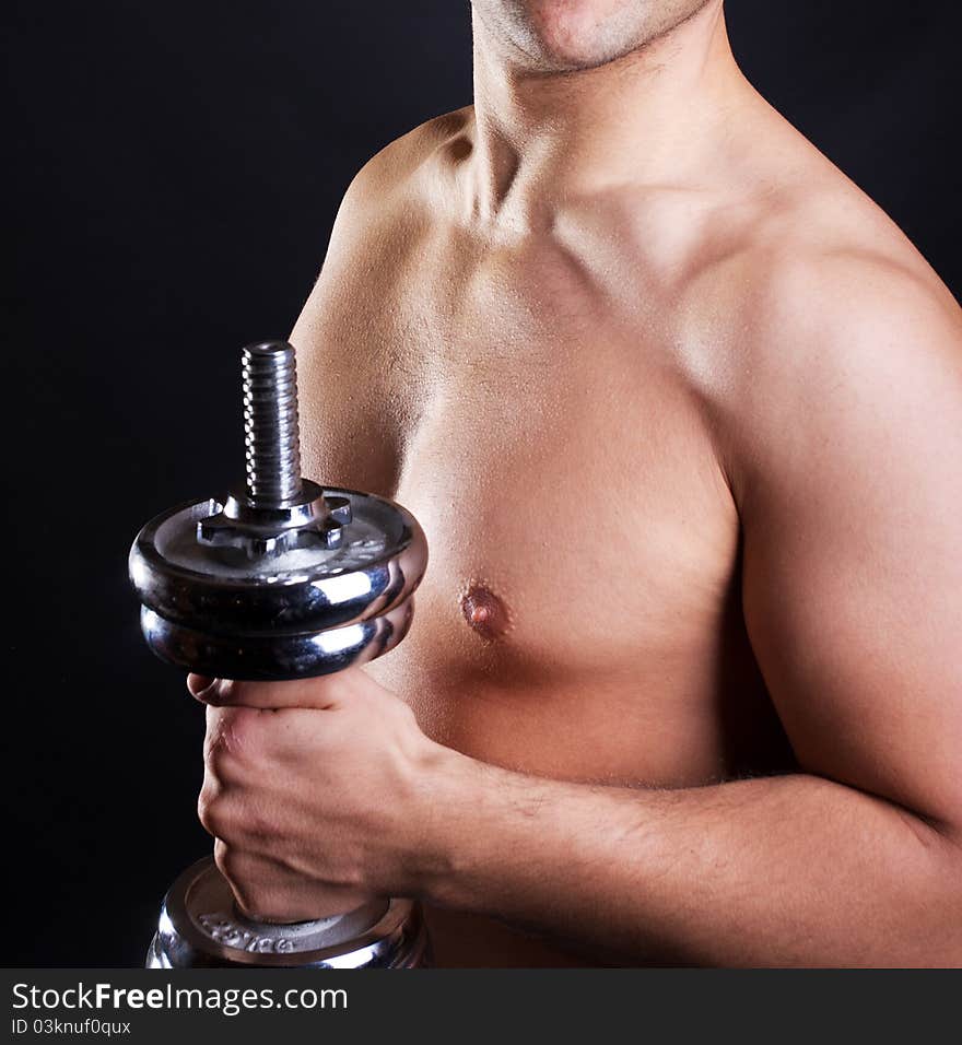 Image of sexy body and dumbbells. Image of sexy body and dumbbells