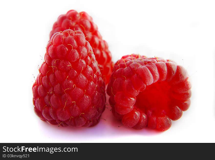 Isolated fruits - raspberries on a white background