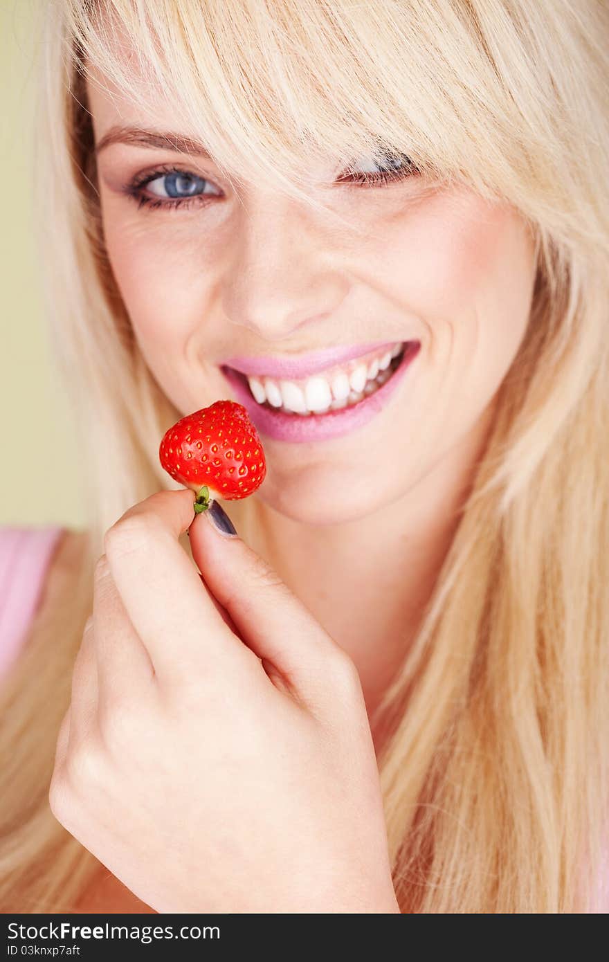 Woman eat strawberry very fresh and natural. Woman eat strawberry very fresh and natural