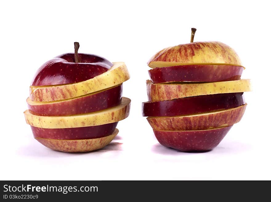 Close up view of some red apples isolated on a white background.