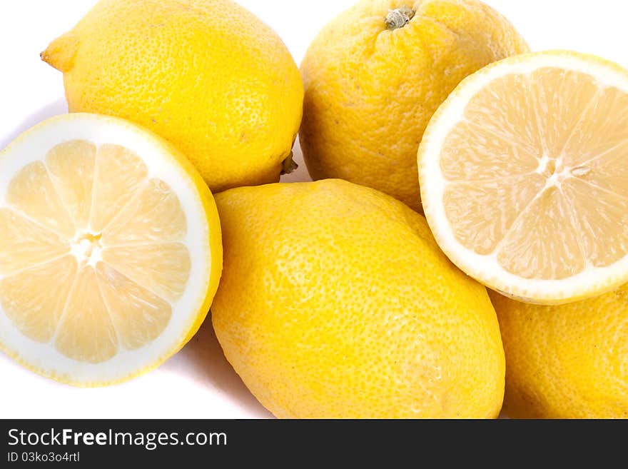 Close up view of bunch of lemons isolated on a white background. Close up view of bunch of lemons isolated on a white background.