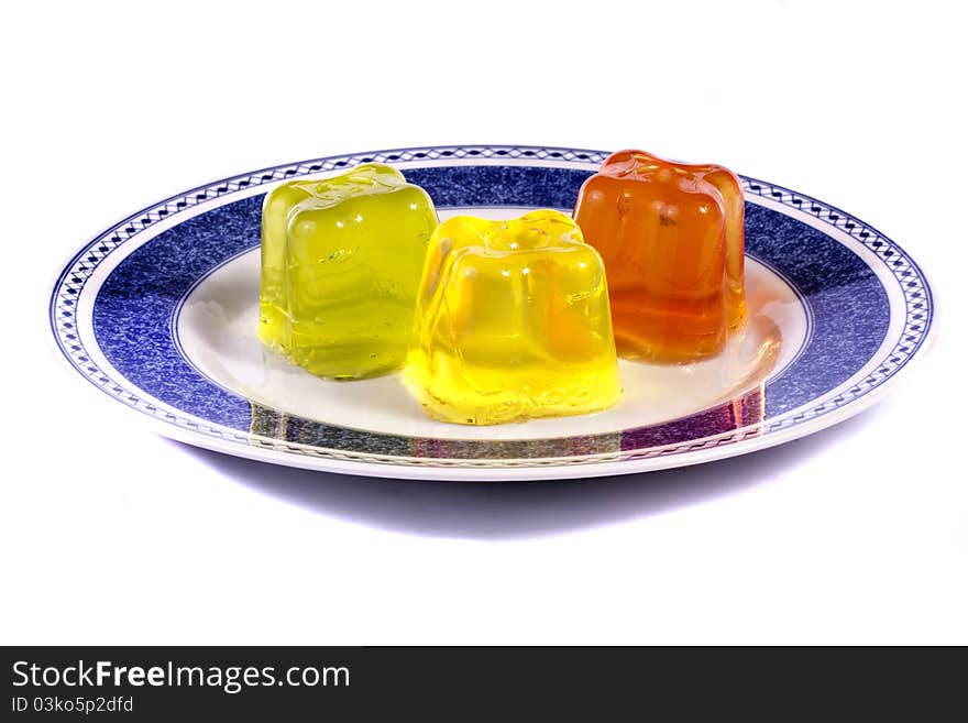 Close up view of several colorful gelatins isolated on a white background. Close up view of several colorful gelatins isolated on a white background.