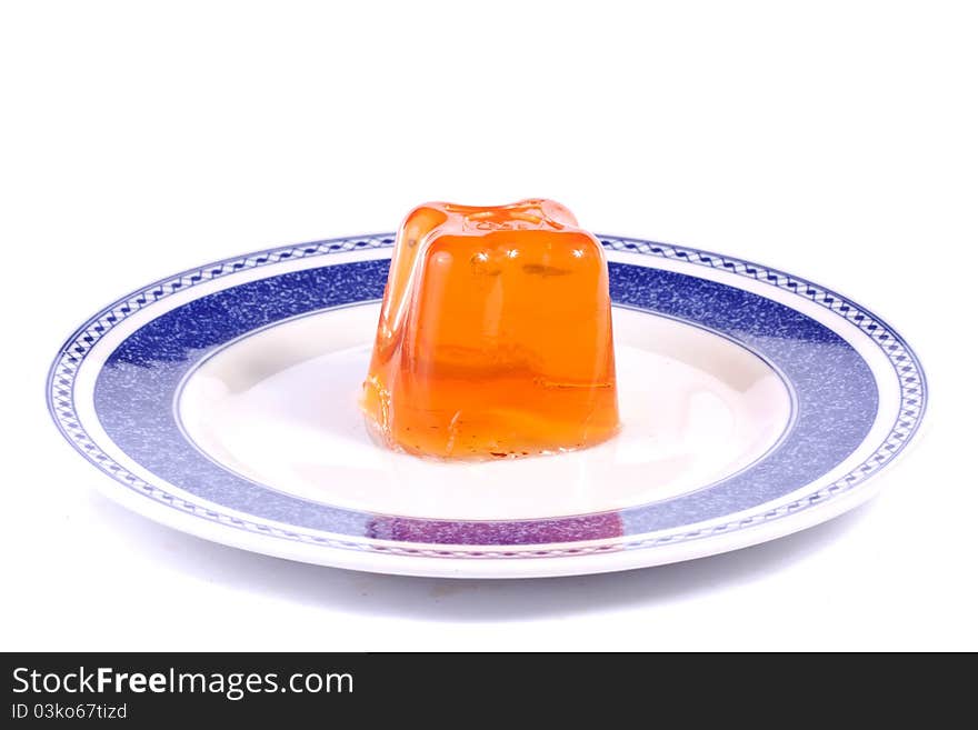 Close up view of a orange gelatin isolated on a white background.