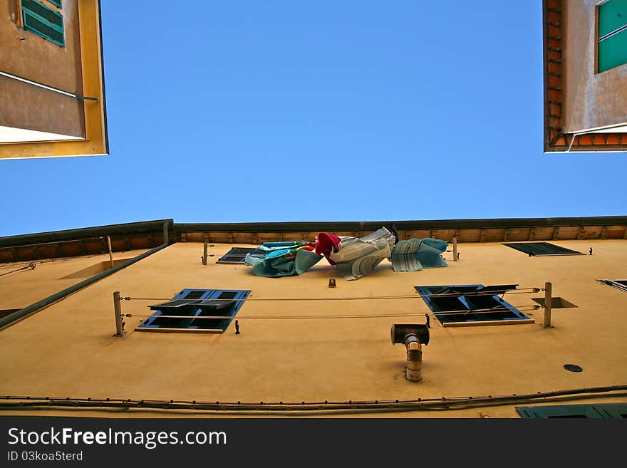 Italy, Piombino narrow street, details of life. Italy, Piombino narrow street, details of life