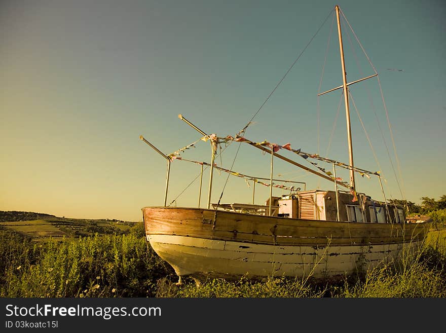 Italy, Tuscan coast, ship in the hills. Someone is living in it. Italy, Tuscan coast, ship in the hills. Someone is living in it.