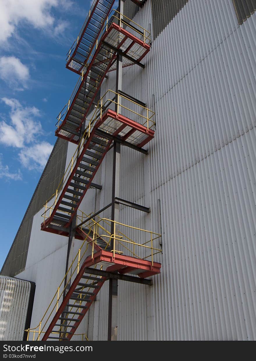 Steel staircase on the outside of an industrial building