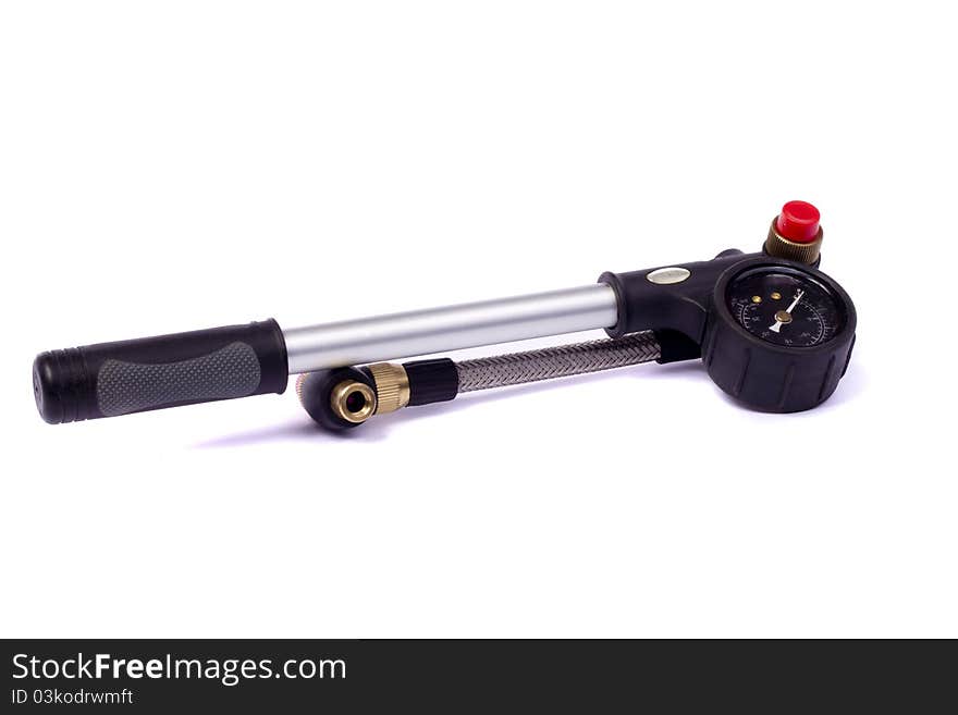 Close up view of a bicycle air pump isolated on a white background.