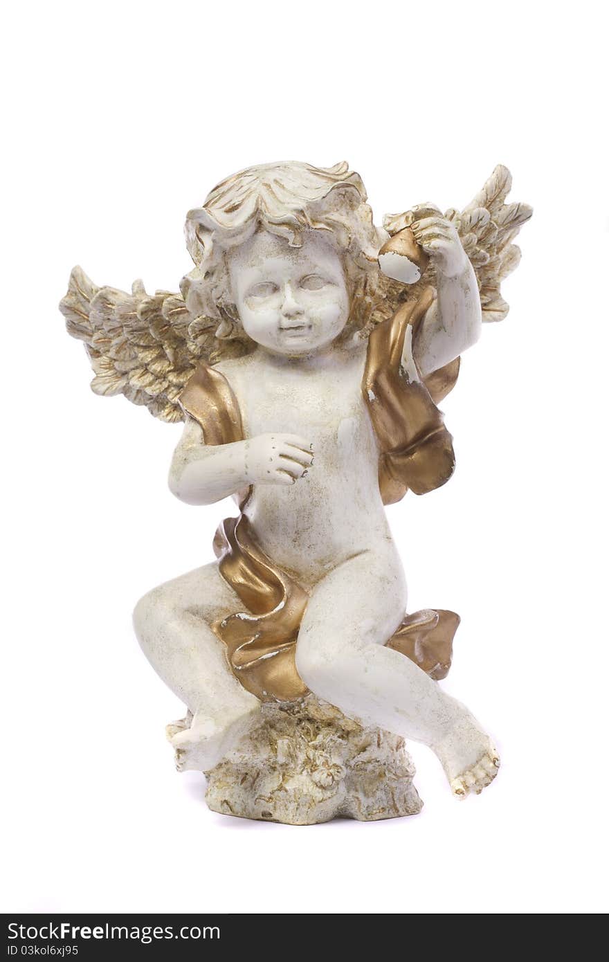 Close up view detail of a ceramic angel isolated on a white background.