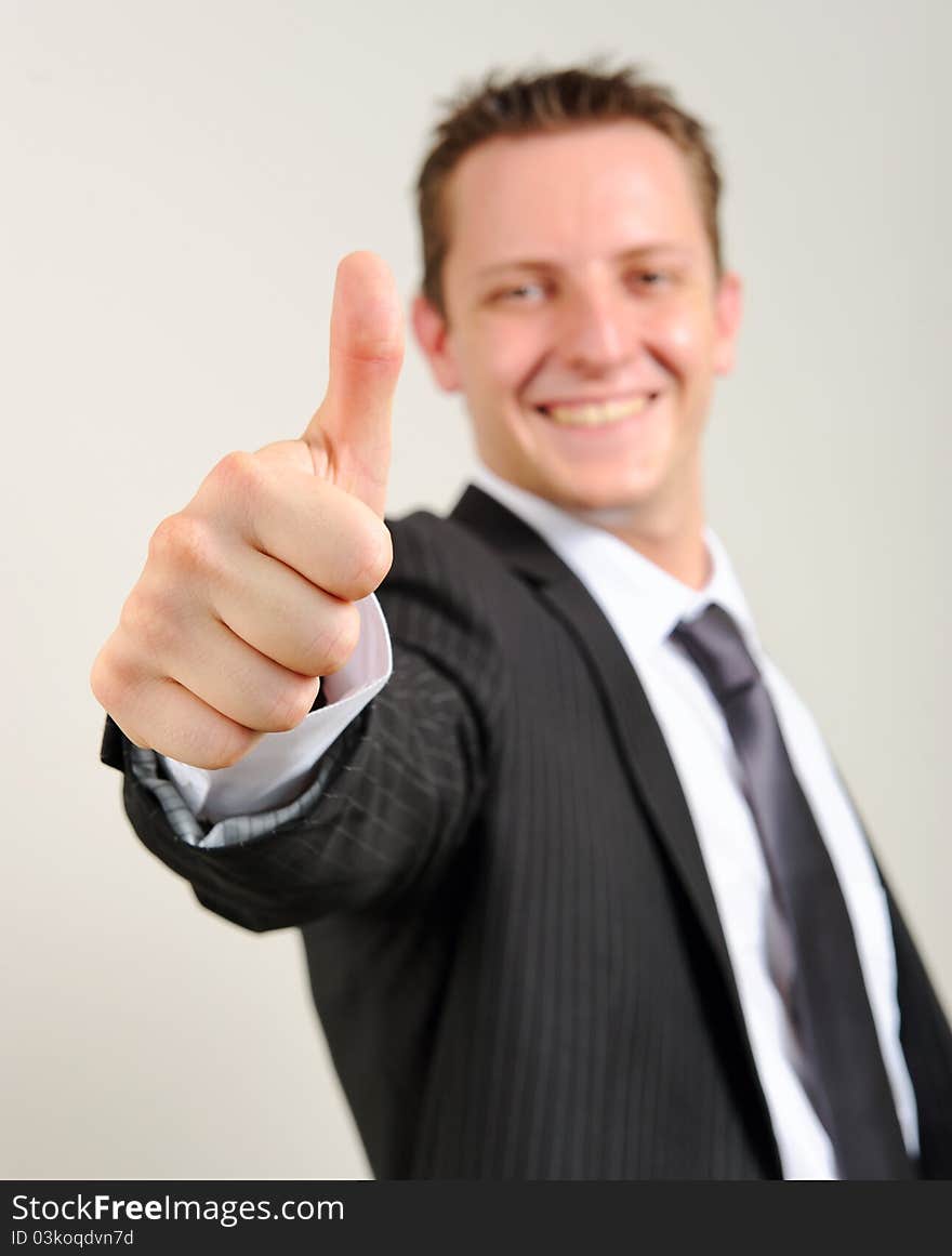 Professional caucasian man gives the thumbs up. Professional caucasian man gives the thumbs up