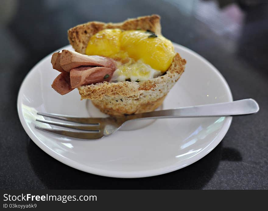 Sausage with egg bun at one of the newly open shop in town