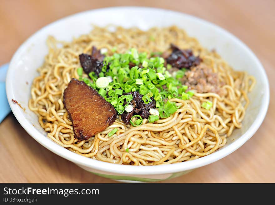 Dried noodle in dark soy sauce