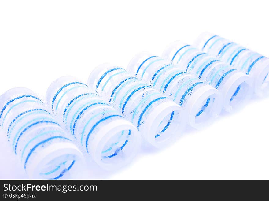 Curlers isolated on white background.