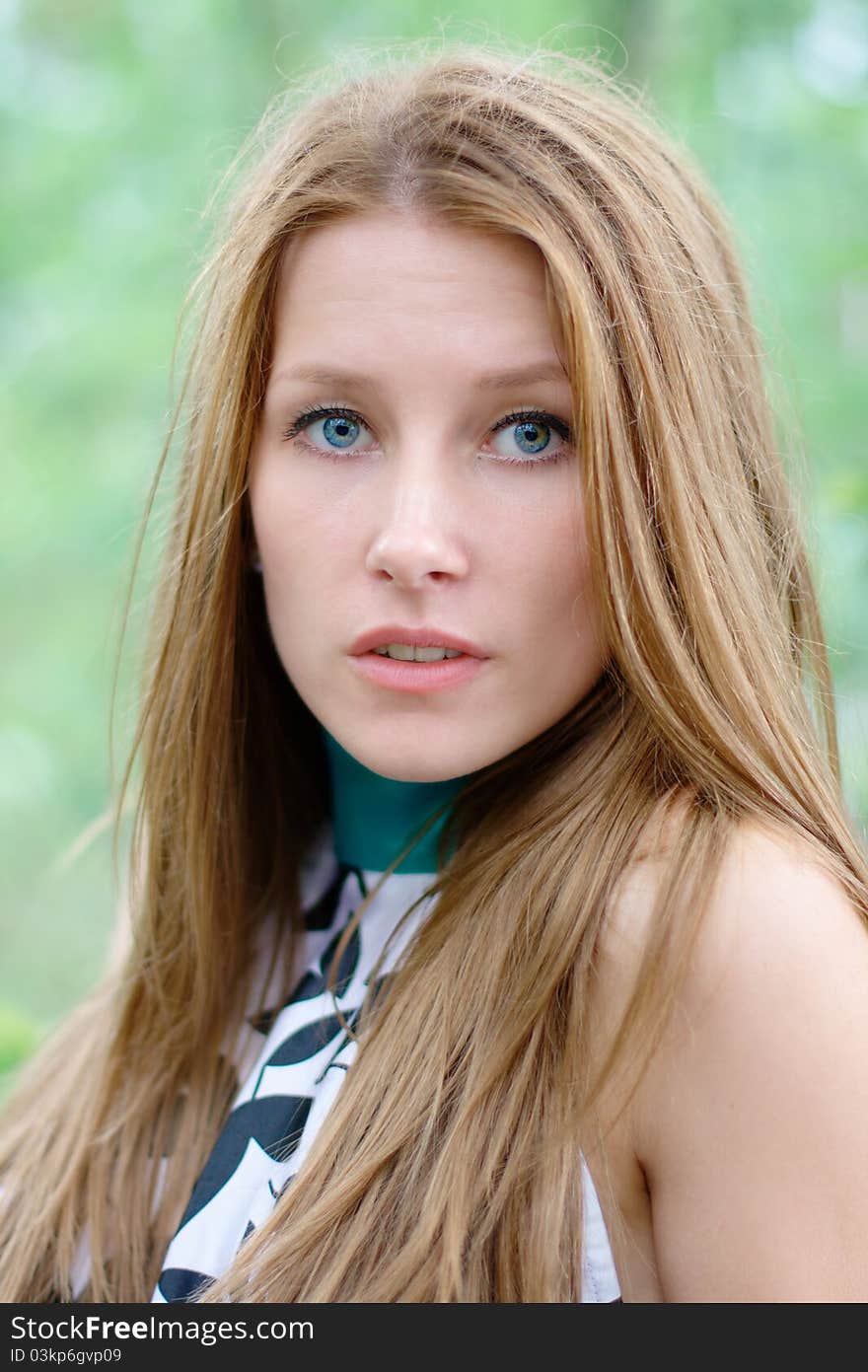 Portrait of a beautiful girl at the park