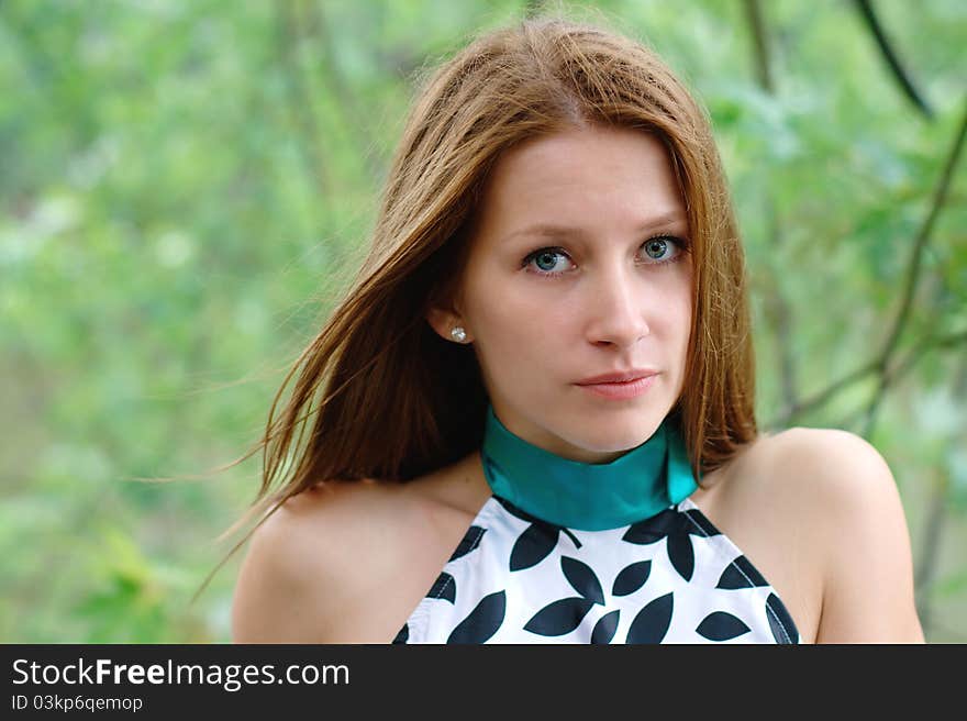 Portrait of a beautiful girl at the park