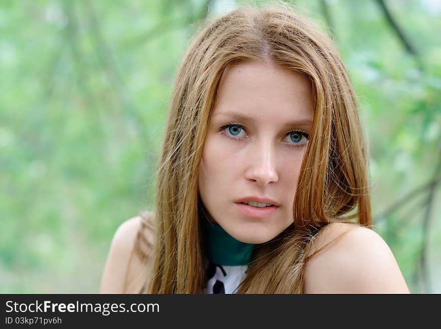 Portrait of a beautiful girl at the park