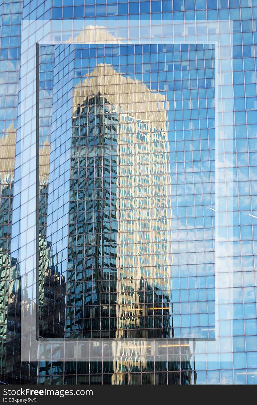 An abstract composition of several edifices of downtown Manhattan reflecting in other ones. An abstract composition of several edifices of downtown Manhattan reflecting in other ones.