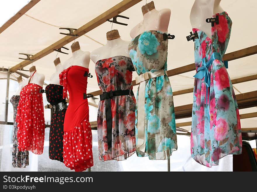 Row of clourfull summerdresses