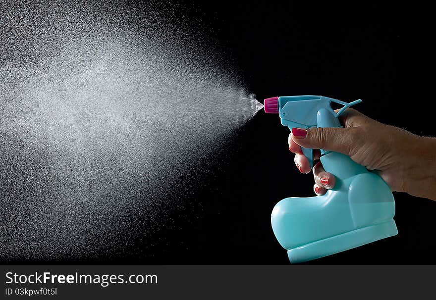 Hand that shoot water in air by spray. Hand that shoot water in air by spray