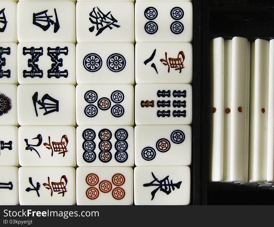 Part of a set of mah jong tiles with the holders.