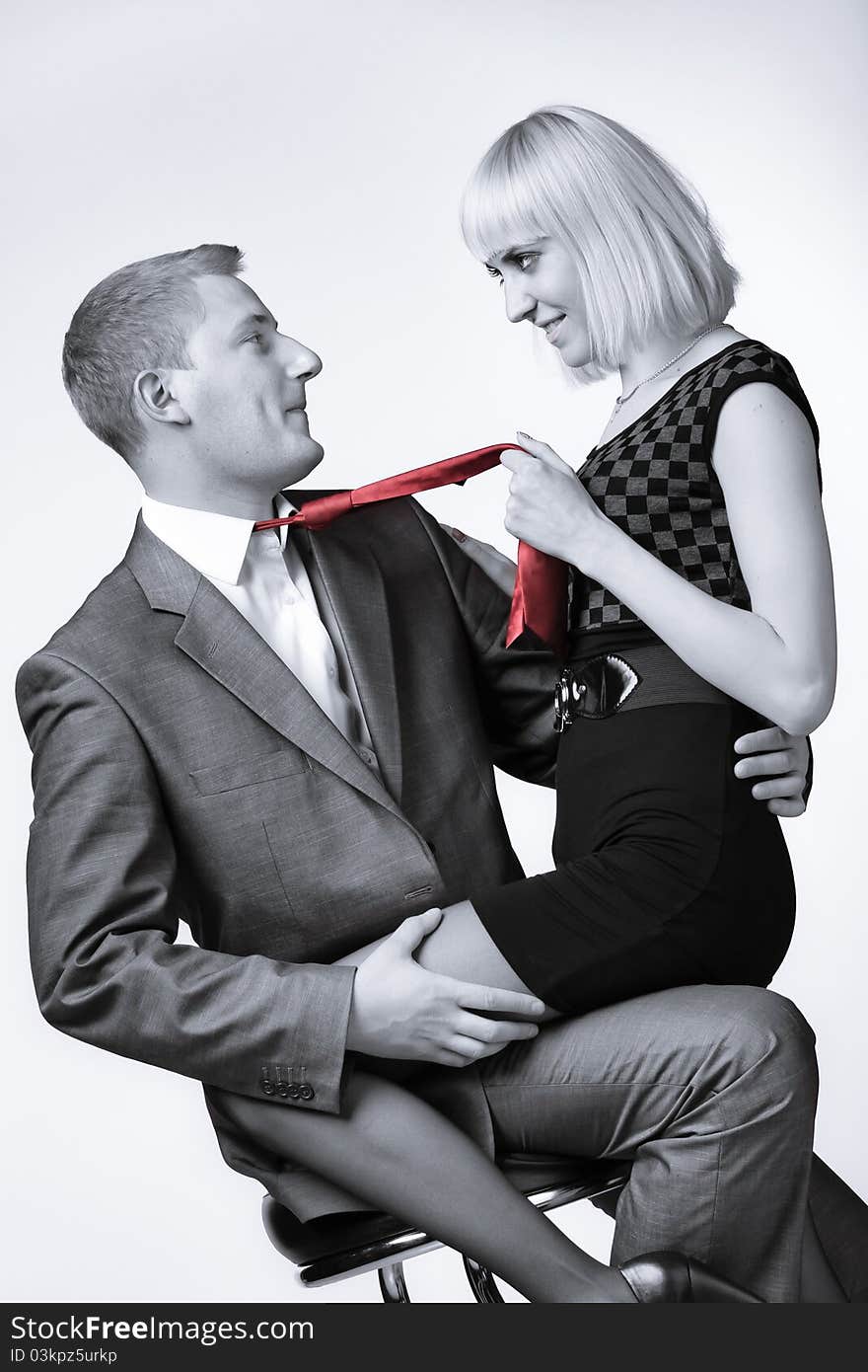 Beautiful young couple posing on a colored background. Beautiful young couple posing on a colored background