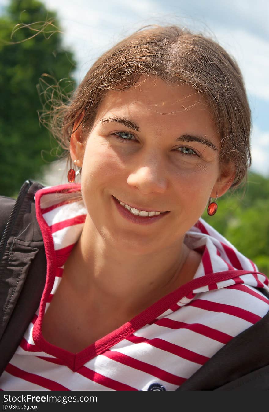 Portrait of a young woman smiling, happy. Portrait of a young woman smiling, happy