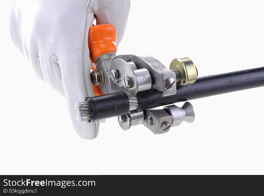 Hand holding a wire cutter on a white background and stripe the wire with white glove. Hand holding a wire cutter on a white background and stripe the wire with white glove