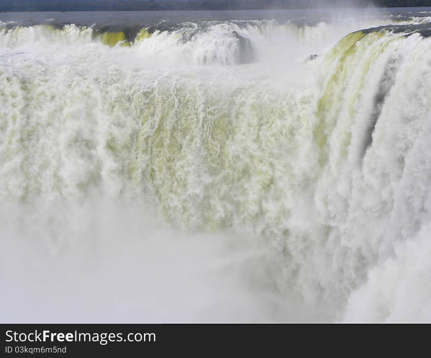 Iguazu Falls - a complex of waterfalls on the Iguazu River located on the border of Brazil and Argentina, has a width of 2.7 km and includes approximately 270 separate waterfalls. Height of drop of water reaches 82 meters. Iguazu Falls - a complex of waterfalls on the Iguazu River located on the border of Brazil and Argentina, has a width of 2.7 km and includes approximately 270 separate waterfalls. Height of drop of water reaches 82 meters.