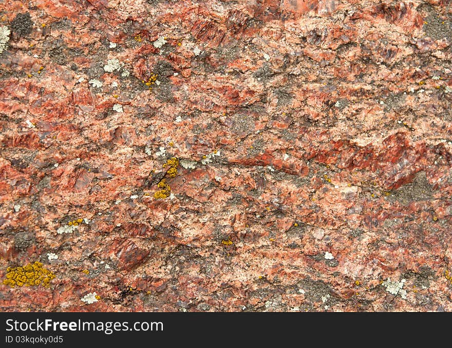 Texture red stone close-up