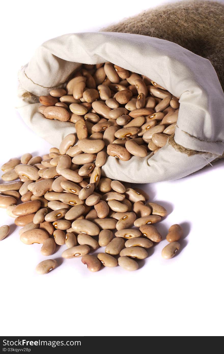 View of a sack of red beans isolated on a white background.