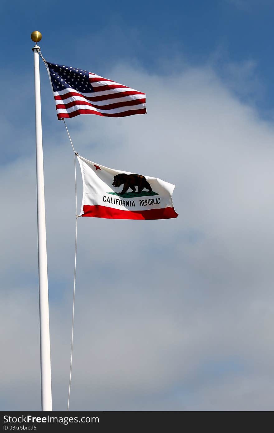 USA flag and California flag together on pole. USA flag and California flag together on pole