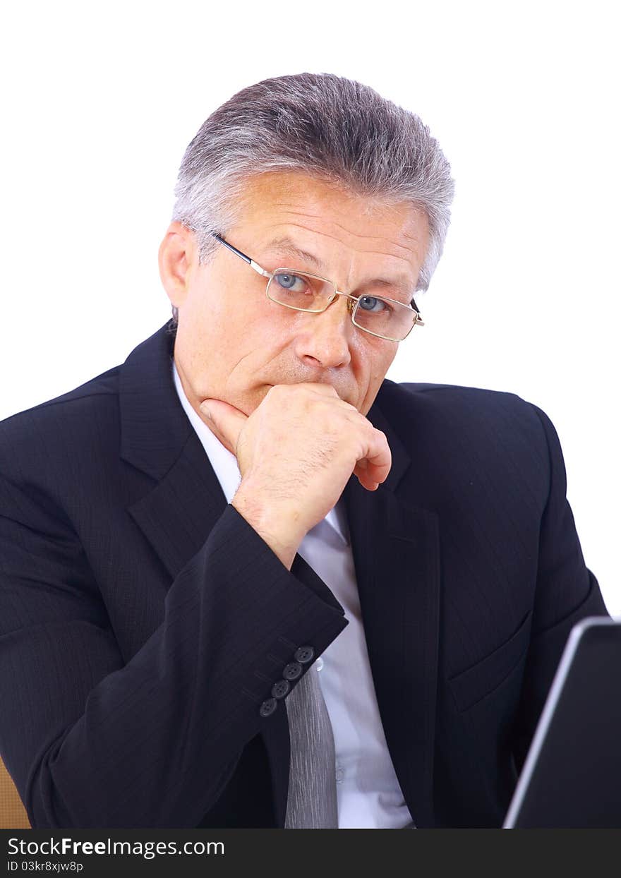 Senior business man working on laptop