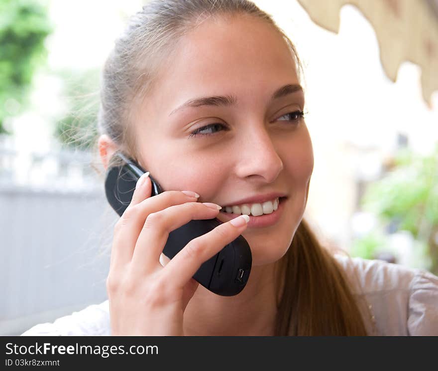 Girl with phone outdoor