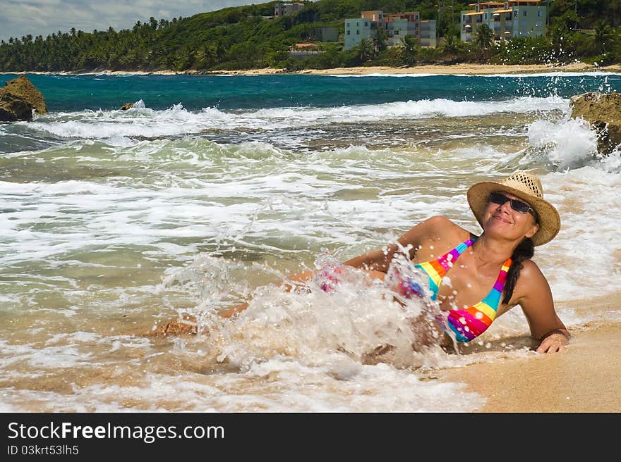 Woman lying on the beach