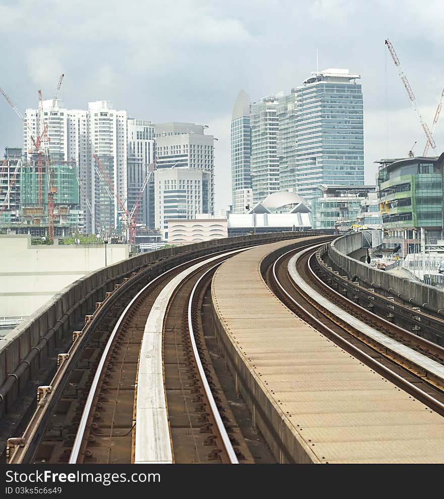 Cityscape with railway and high office buildings in Kuala Lumpur, Malaysia