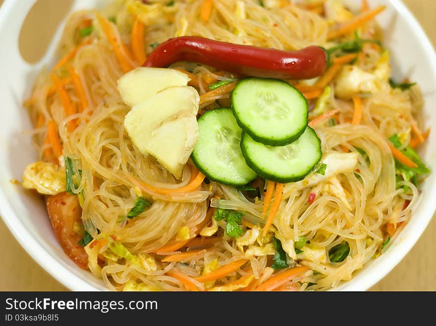 Salad of Korean noodle in the white bowl