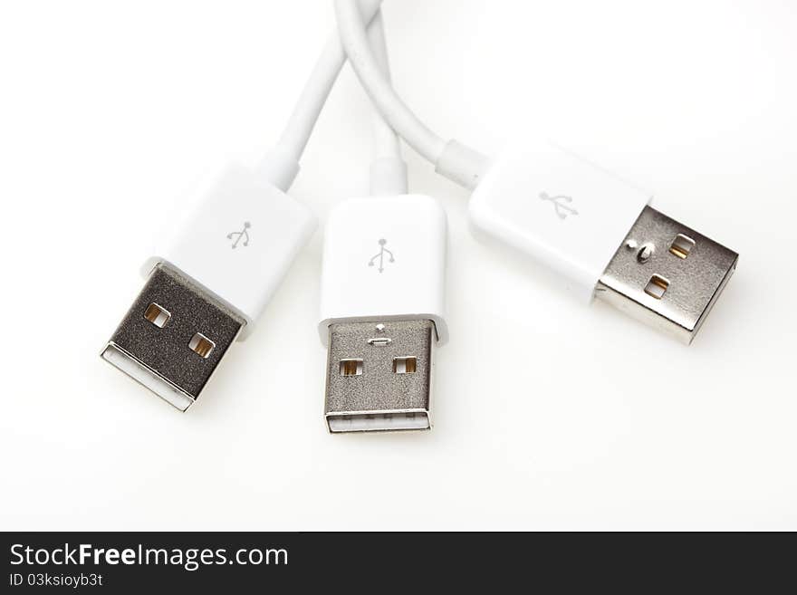 A white USB cable against a white background