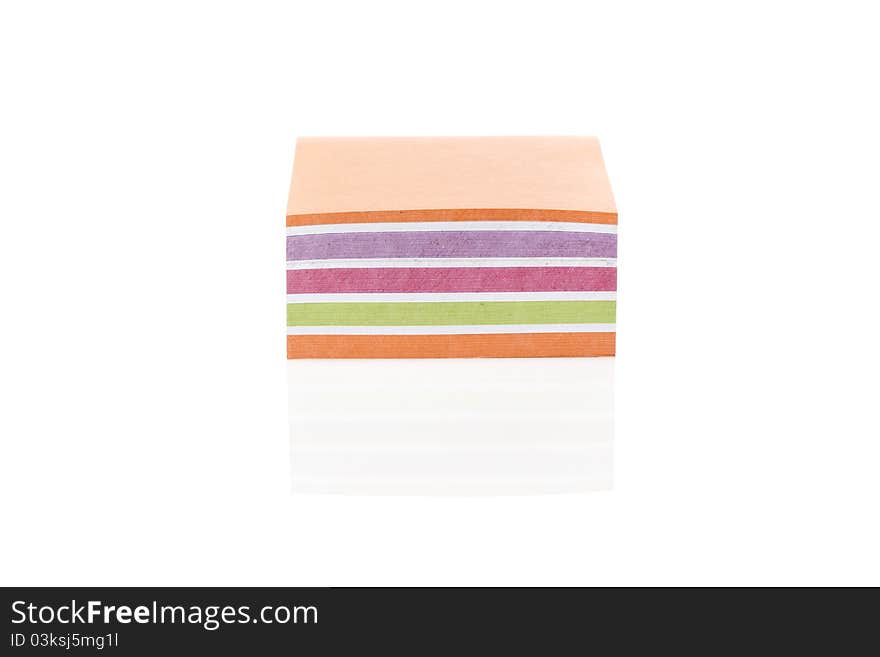 A colorful note pad against a white background