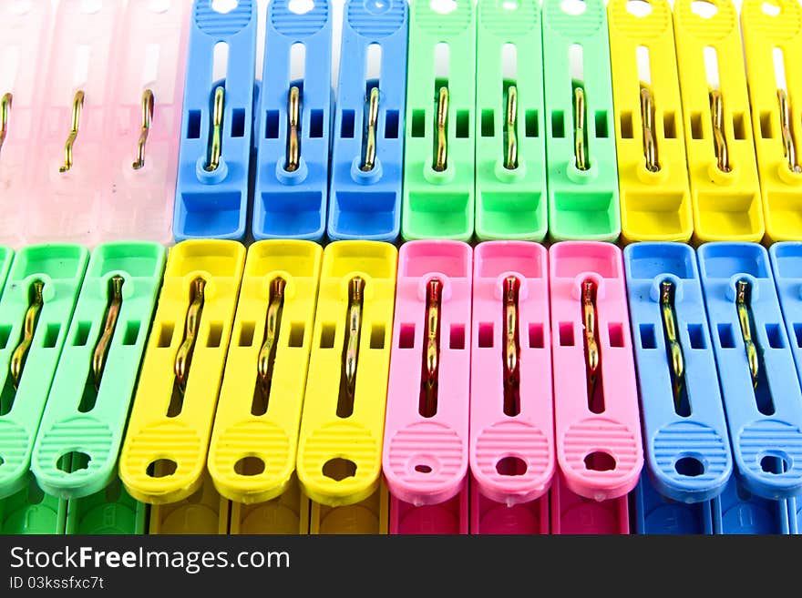 Close up of many colorful clothes pins