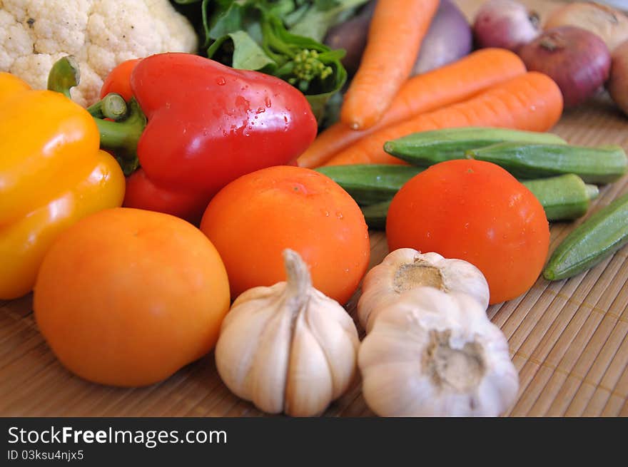 Various types of vegetables placed on bamboo mat. Various types of vegetables placed on bamboo mat.