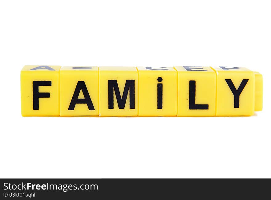 An image of yellow blocks with word ''family'' on them