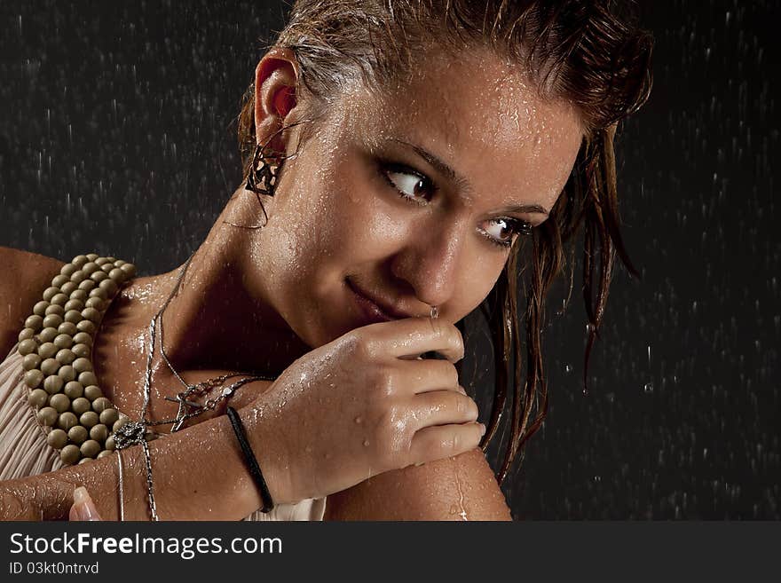 Pretty interesting wet girl walking in the rain