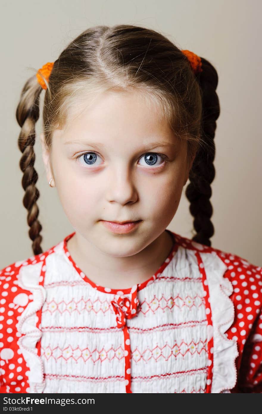 An image of a portrait of a beautiful little girl