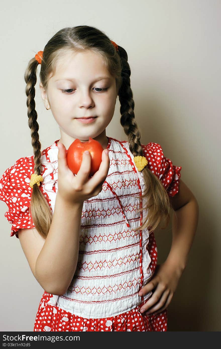 Girl with tomato